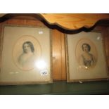 A pair of oval portrait prints