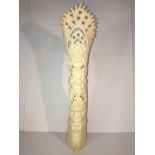 A carved oriental bone? vase