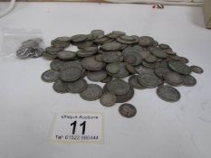 A mixed lot of UK pre 1920 and pre 1947 silver coins together with some USA silver coins