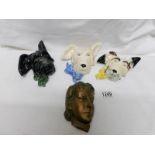 3 ceramic 'dog' wall masks and a plaster deco wall mask