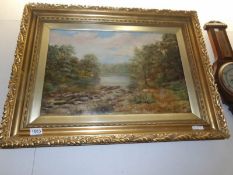 A gilt framed oil on board country scene