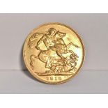 An Edward VII 1910 gold sovereign,