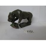 A carved stone cougar