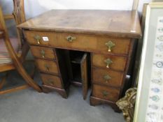 An original Queen Anne kneehole desk