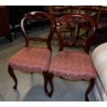 A pair of Victorian cabriole leg chairs