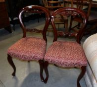 A pair of Victorian cabriole leg chairs