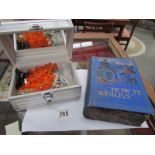 An unusual 'book' jewellery box with contents and a metal jewellery case and contents