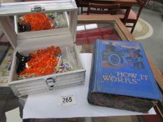 An unusual 'book' jewellery box with contents and a metal jewellery case and contents