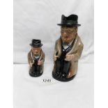 A Royal Doulton Winston Churchill Toby jug and a smaller example