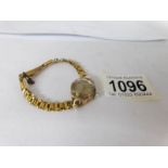 A 9ct gold ladies wrist watch