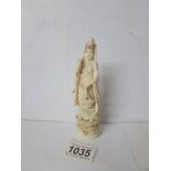 A carved bone Chinese figure