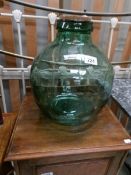 A large glass carboy