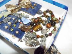 A mixed lot of costume jewellery including some silver