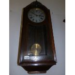 An oak wall clock