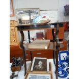 An Edwardian mahogany inlaid occasional table