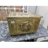 A brass log box