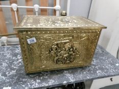 A brass log box