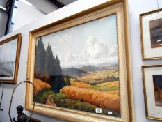 A framed and glazed country scene