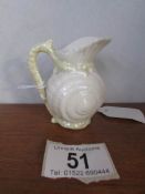 A small Belleek porcelain jug