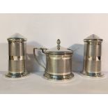 A silver cruet set comprising salt, pepper and mustard, hall marked Birmingham 1940/41,