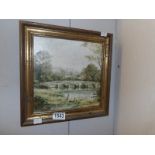 An oil painting of a rural village scene featuring a stone bridge over river signed Mike Knight