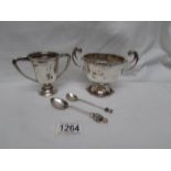 A silver sugar bowl, a silver trophy and 2 silver spoons,