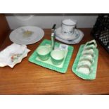 A Shelley toast rack, a trio, an egg cup stand (missing 2 egg cups),