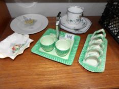 A Shelley toast rack, a trio, an egg cup stand (missing 2 egg cups),