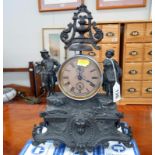 A 19th century French spelter alarm clock in working order