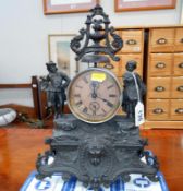 A 19th century French spelter alarm clock in working order