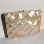 A Victorian mother of pearl wallet style card case