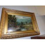 A gilt framed oil on board of cattle by stream