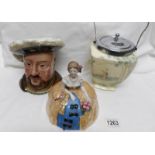 A Henry VIII character jug, a biscuit barrel and a crinoline lady trinket pot