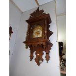 An oak wall clock