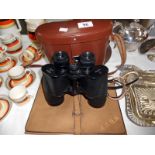 A fine cased pair of Jena 15 x 50 binoculars and a leather stationery wallet with dip pen