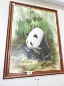 A Krit Choy oil on board of a panda with bamboo