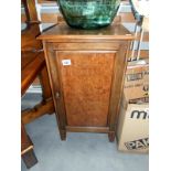 A walnut pot cupboard