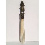 A mother of pearl letter opener with Joan of Arc finial