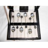 A cased set of 6 silver coffee bean spoons