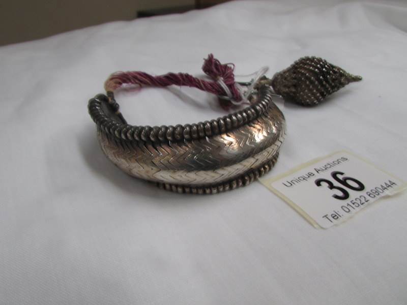 A rare antique silver coloured metal reticulated wrist bangle, - Image 6 of 6