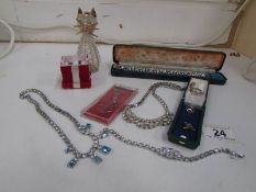 A mixed lot of jewellery including costume and silver