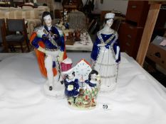 A pair of Staffordshire figures,