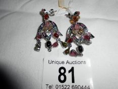A pair of silver and multi gem stone earrings