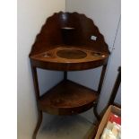 A mahogany corner washstand