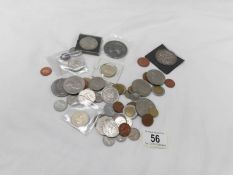 A box of assorted coins,
