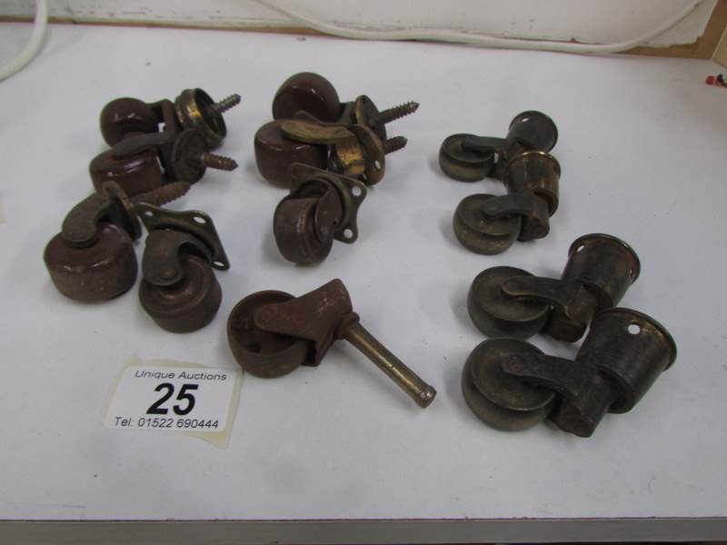 A quantity of old furniture castors