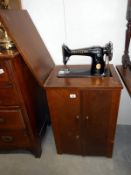 A Singer cabinet sewing machine