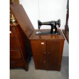 A Singer cabinet sewing machine