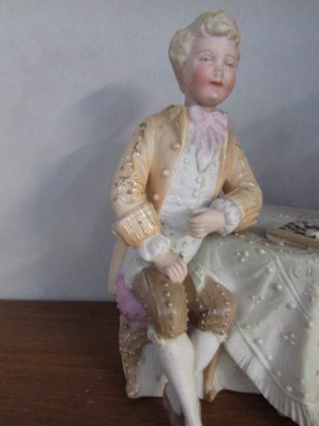 A German bisque porcelain nodding head group of lady and gentleman playing chess (ladies hand is - Image 3 of 3