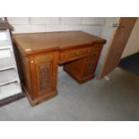 A kneehole desk